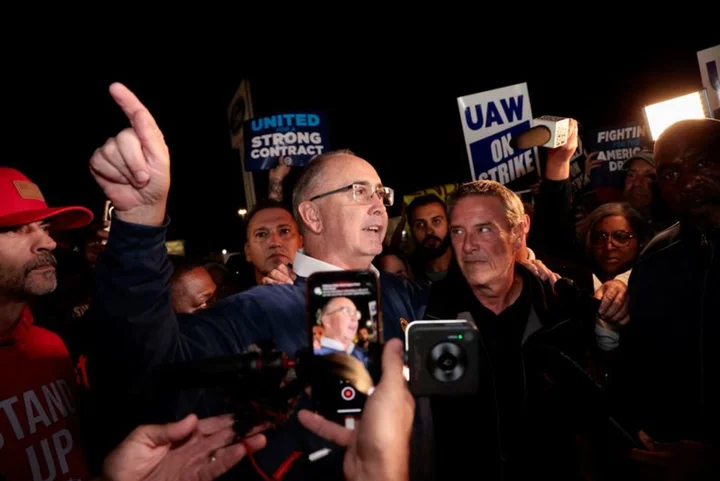 Hundreds gather at Ford plant in Michigan as auto workers begin historic strike