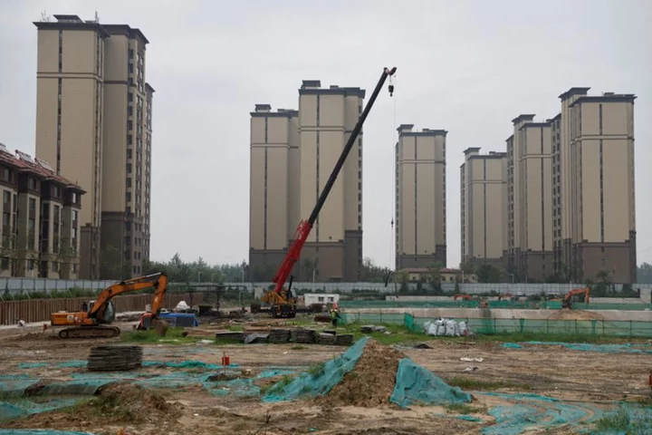 Moody's cuts China property sector's outlook to negative