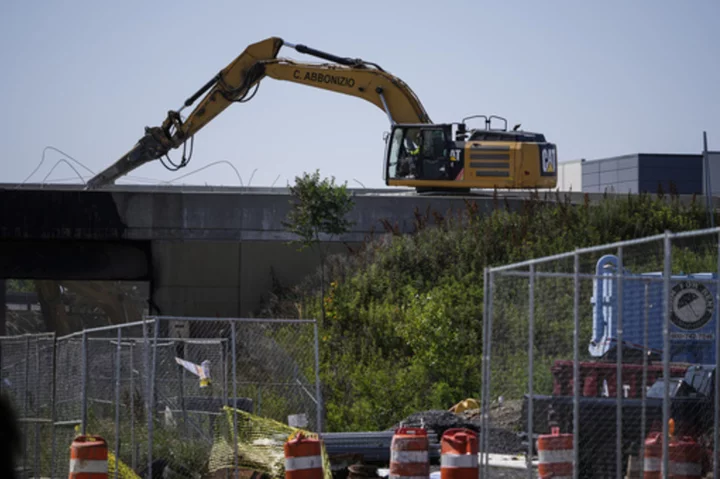 In the effort to reopen I-95 in Philadelphia, crews get some help from a NASCAR jet dryer