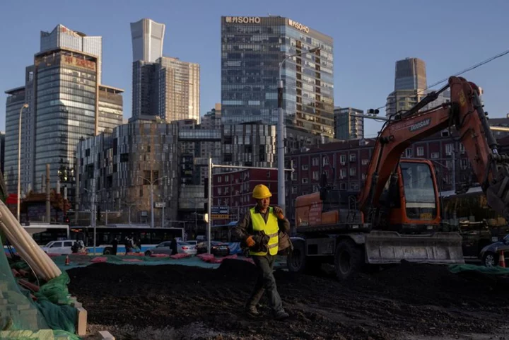 China's central bank sets economy guidelines, local debt risks