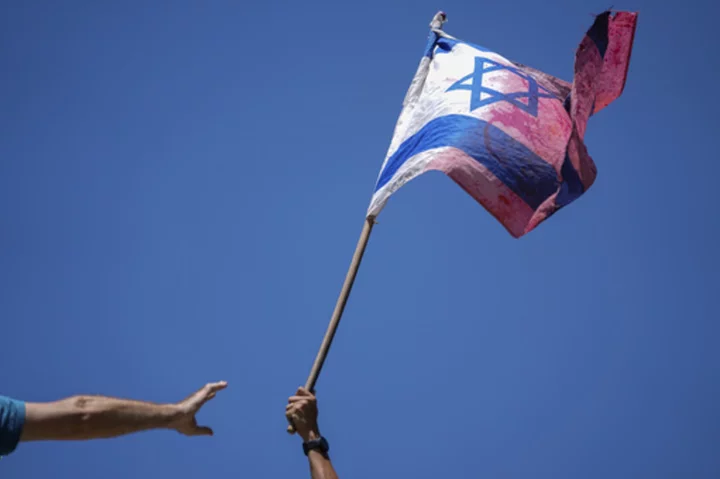 AP PHOTOS: Unrest grips Israel as the parliament adopts a law weakening the Supreme Court