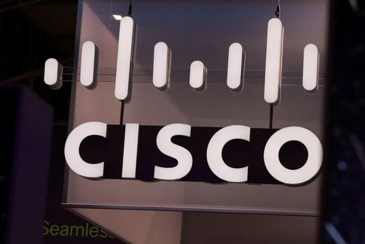 Cisco slumps after cutting annual profit, revenue forecasts