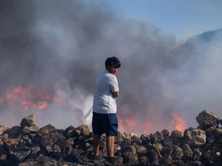 UK rescue flights for tourists fleeing ‘out of control’ wildfires in Rhodes and Corfu