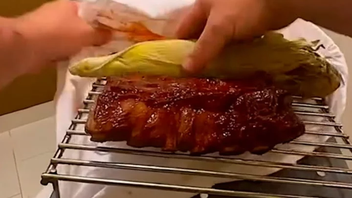 TikToker cooks rack of ribs in hotel bathroom using only items from his room