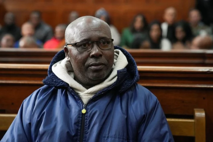 Rwanda suspect denies killings but 'sorry' over genocide