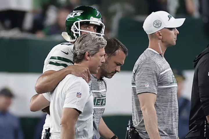 Jets QB Aaron Rodgers has torn left Achilles tendon, AP source says. He's likely to miss the season