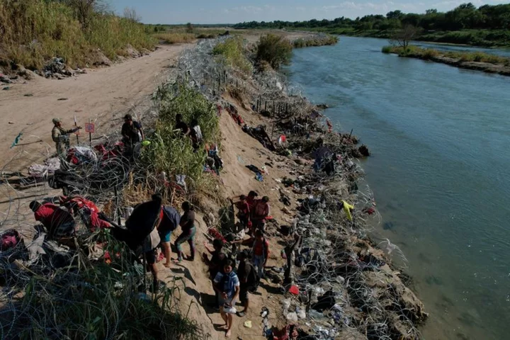 US to build new barriers, roads in Texas border area