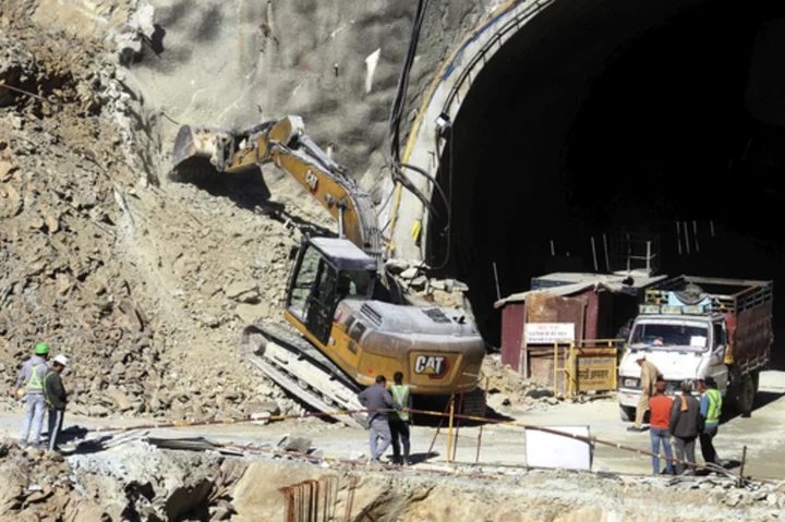 41 workers in India are stuck in a tunnel for an 8th day. Officials consider alternate rescue plans