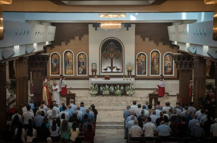 A feud between a patriarch and a militia leader adds to the woes of Iraqi Christians