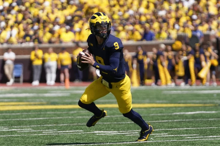 J.J. McCarthy leads No. 2 Michigan over East Carolina 30-3 without Jim Harbaugh on the sideline