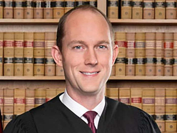 Who is Scott McAfee, the judge assigned to oversee Trump case in Georgia?