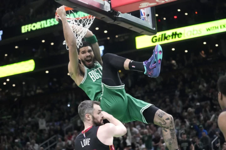 Celtics thrive on 3s, beat Heat 110-97 in Game 5 to extend East finals