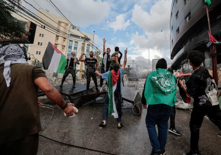 Protesters near U.S. embassy in Beirut sprayed with water cannon, teargas