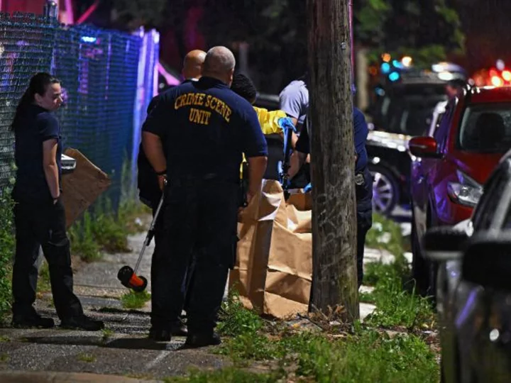 Philadelphia police search for motive in a shooting believed to have left 5 dead and 2 children injured