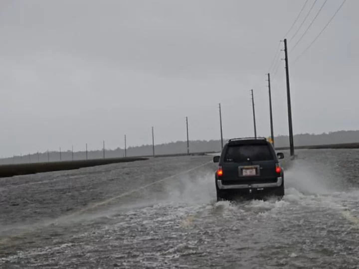 Tropical Storm Ophelia lashes parts of the East Coast ahead of expected landfall in North Carolina this morning