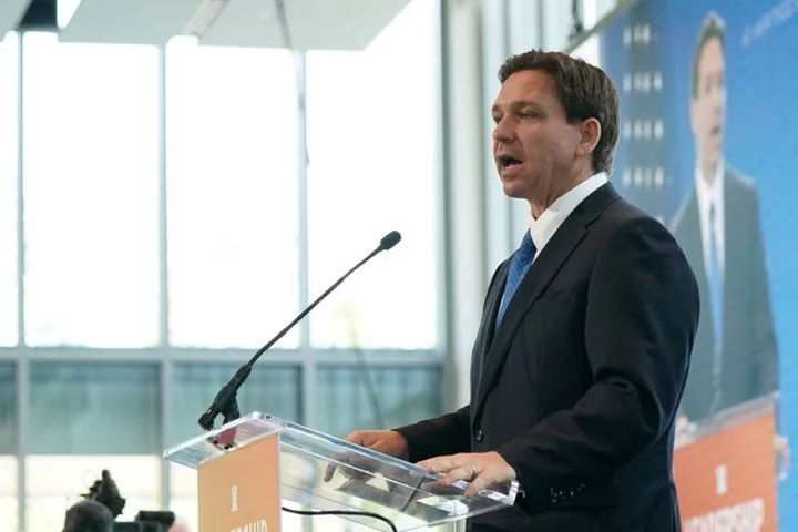 Explainer-Why is Ron DeSantis in a feud with Disney World Florida?