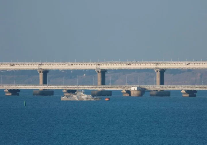 Blasts on Crimea Bridge kill two, threaten Russian war supply lines