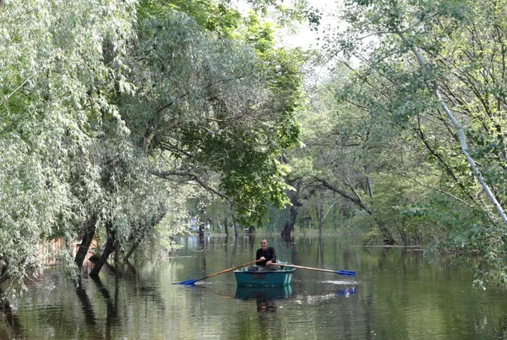 Ukraine blames Russian-occupied dam as village grapples with flooding