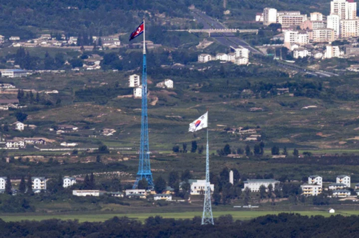 South Korea delays its own spy satellite liftoff, days after North's satellite launch