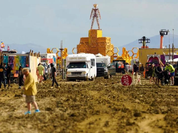 From wood blocks to 'poop buckets,' how Burning Man organizers told festivalgoers to prepare for heavy rain