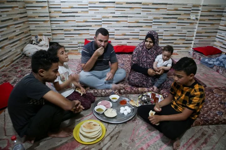 Sleepless Gazans keep children, essentials close as Israeli bombing goes on