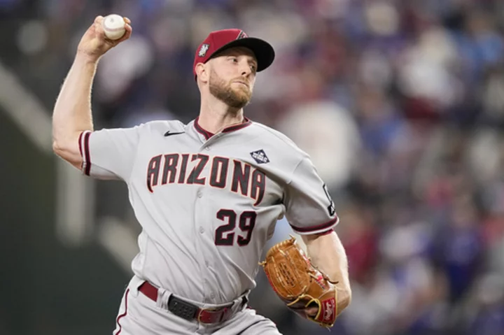 Kelly dominates on mound as Diamondbacks bounce back to rout Rangers 9-1 and tie World Series 1-all