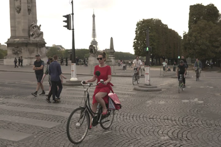 Long a city that embraced cars, Paris is seeing a new kind of road rage: Bike-lane traffic jams