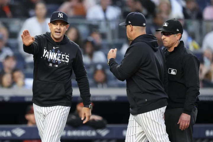 Yankees' Aaron Boone suspended 1 game by MLB for conduct toward umpires