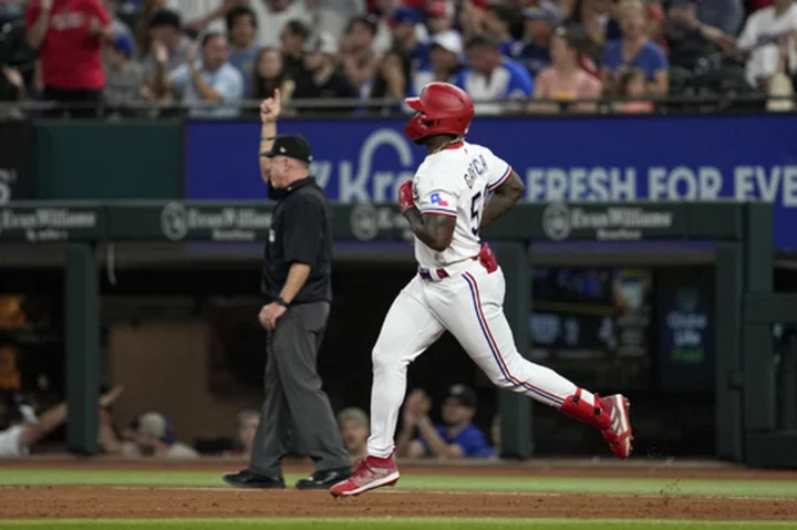 Garcia extends MLB-best RBIs total, Rangers beat Braves 7-4