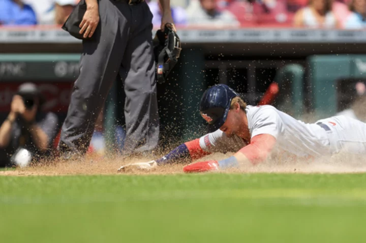 Gorman leads Cardinals over Reds 2-1, 13th win in 18 games.