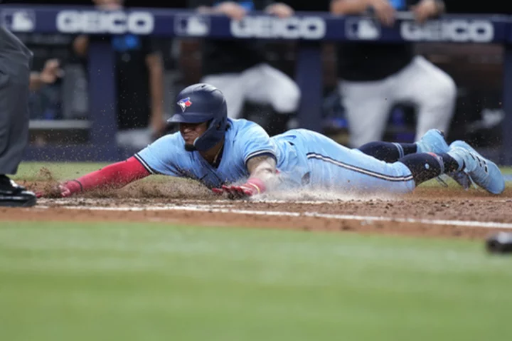 Clement and Springer hit RBI singles in the 8th in the Blue Jays' 2-0 win over the Marlins