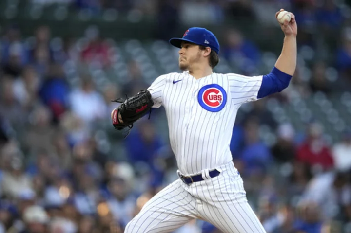 Steele moves to 6-0, Cubs get HRs from Wisdom and Gomes in 10-4 win over Cardinals