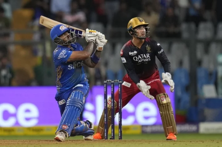 Yadav helps Mumbai beat Bangalore to enter top 4 in IPL