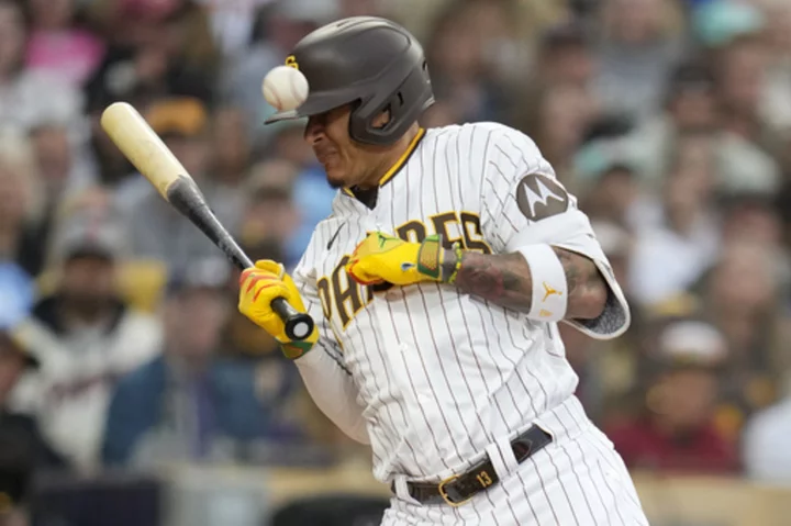 Padres slugger Machado has fracture in left hand, status uncertain