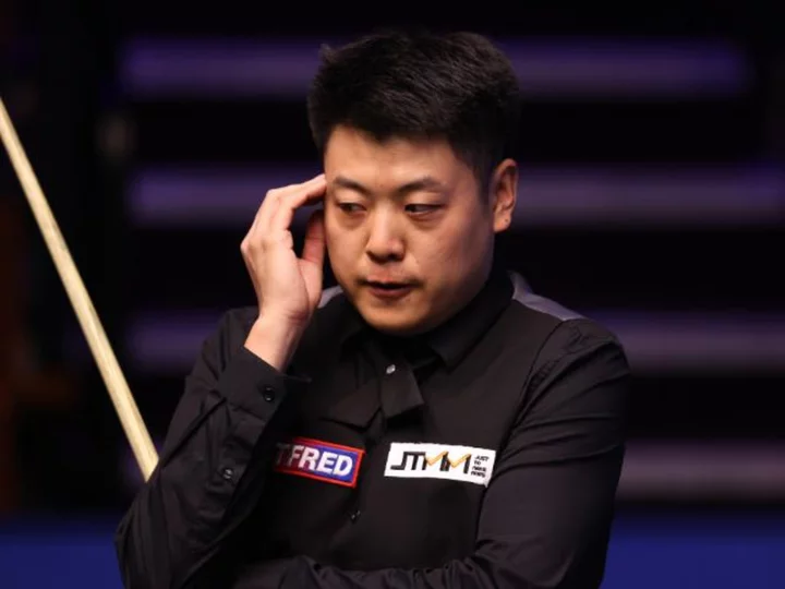 Two Chinese snooker players banned for life for match-fixing, eight others suspended