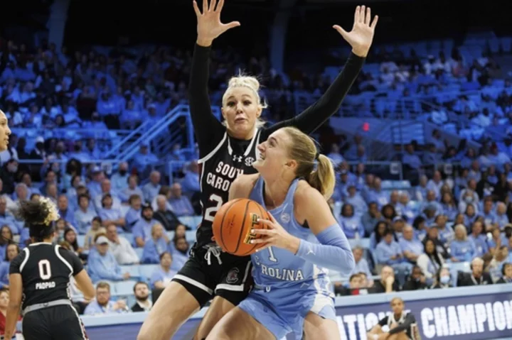 No. 1 South Carolina rallies from 11 down to beat No. 24 UNC 65-58 in ACC/SEC Challenge