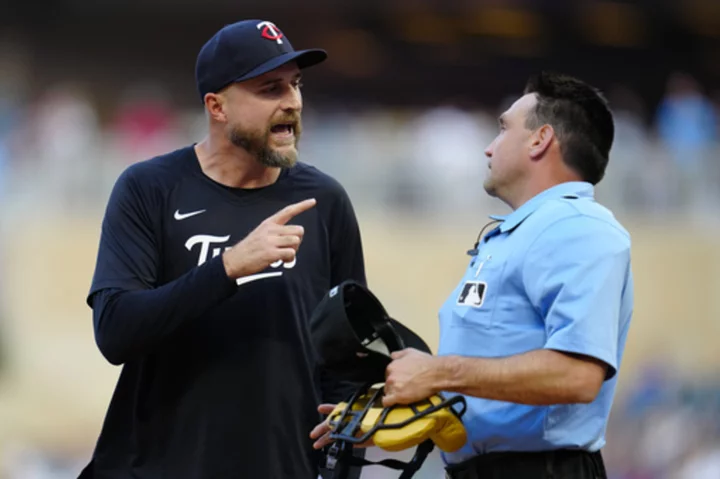 Kyle Farmer's single in the 10th inning carries Twins to a 5-4 win over the Red Sox