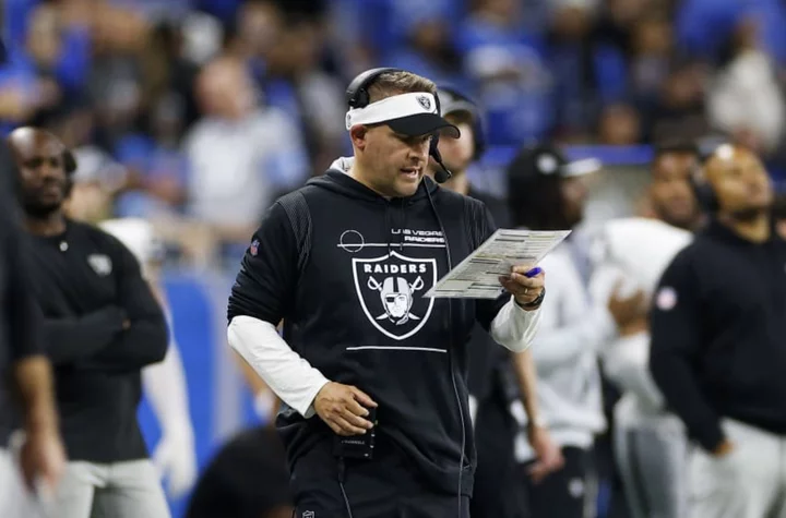 What was Josh McDaniels record coaching Raiders?