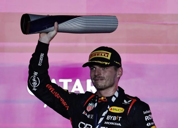 Motor racing-Verstappen adds Qatar win to his title weekend