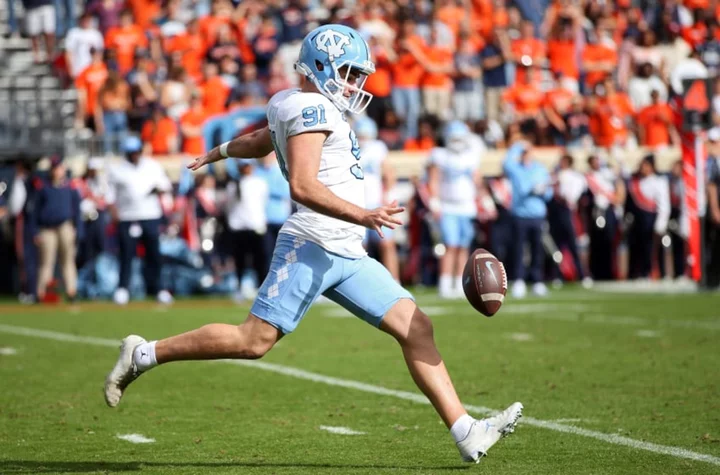 UNC punter’s facemask completely warped after huge hit