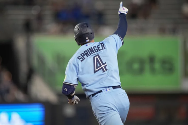 Springer hits a leadoff homer on his birthday, Blue Jays beat the Yankees 7-1