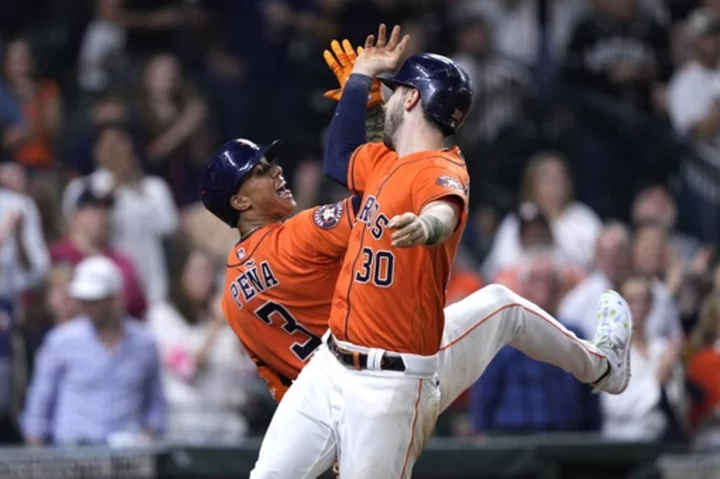 Tucker homers, Altuve makes his season debut in Astros' 5-1 win over Athletics