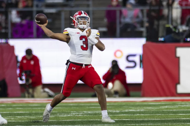 Tagovailoa throws for 361 yards and sets Big Ten passing mark as Maryland beats Rutgers 42-24