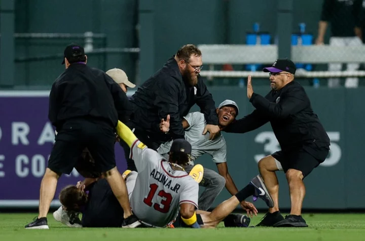 Denver police arrest 2 men who harassed Ronald Acuña Jr. at Coors Field