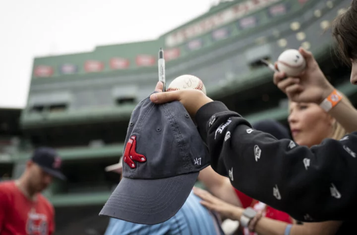 Young Red Sox fan starts family feud by throwing foul ball back