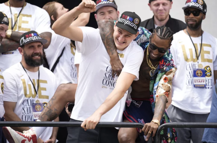 Nuggets celebrate their 1st NBA title with parade through the streets of downtown Denver