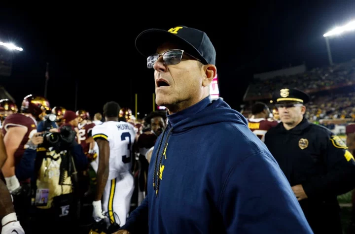 Ohio State fans troll Jim Harbaugh at GameDay over sign-stealing allegations