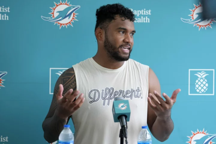 Dolphins' Tua Tagovailoa talks Herbert's record-breaking contract, expectations for this season