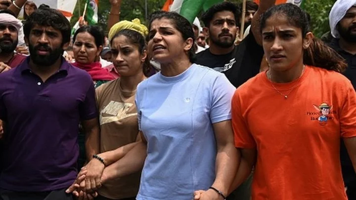 Bajrang Punia and Sakshi Malik: Indian wrestlers pause protest after meeting Anurag Thakur