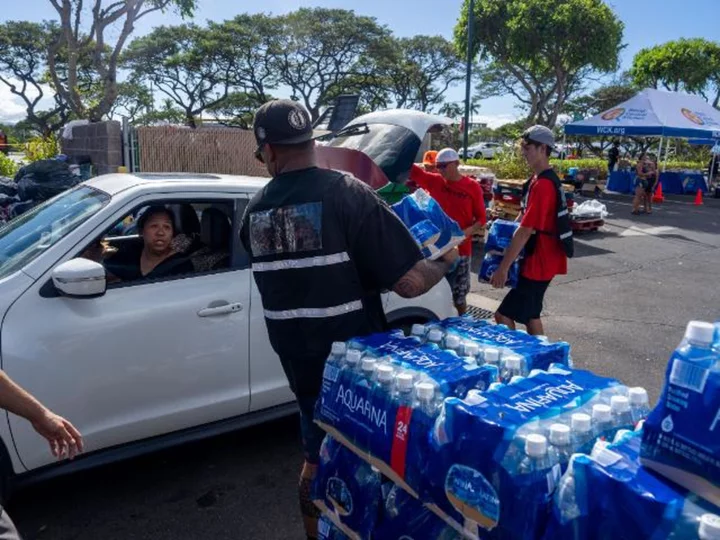 Amid the ash of Lahaina, aid and anger are spreading